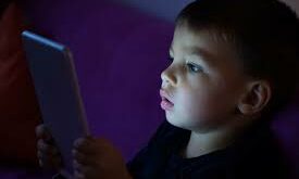Kid on tablet